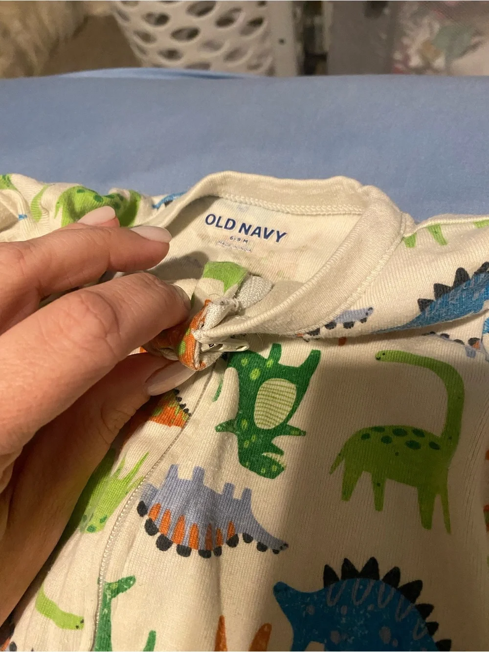 Old Navy White Footed One-Piece Pajama with Green, Blue and Orange Dinosaurs